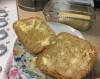 freshly baked flax seed bread with butter.png